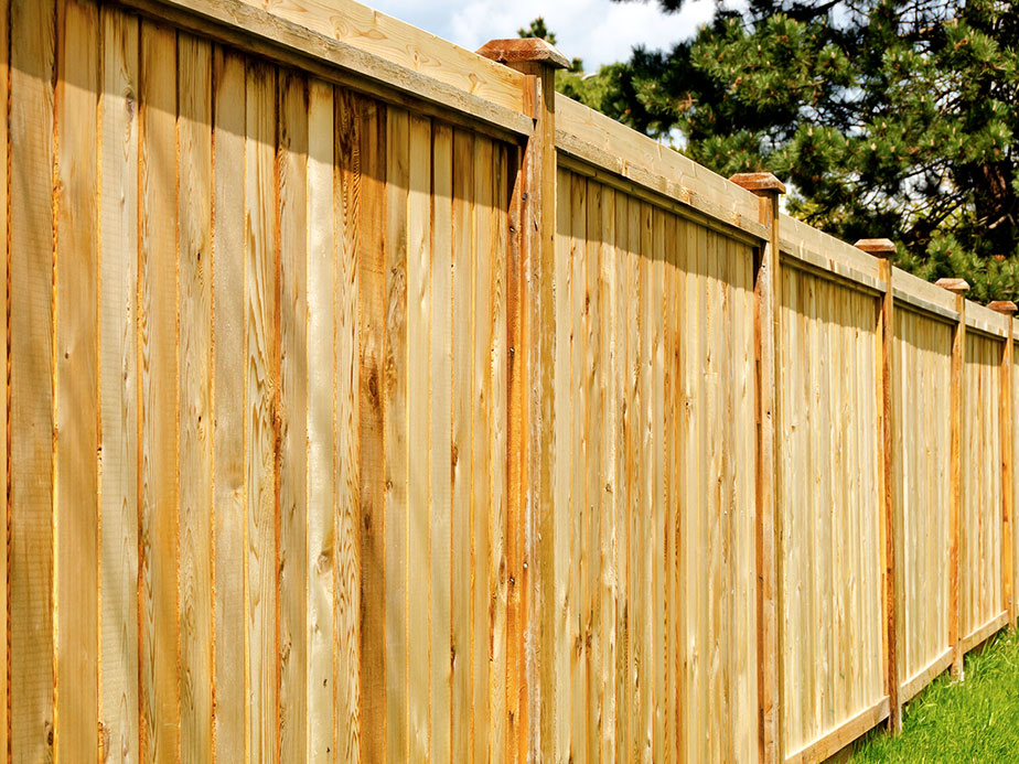 Granger IN cap and trim style wood fence